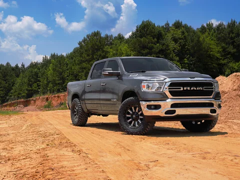 A leveled Ram 1500 on a dirt track